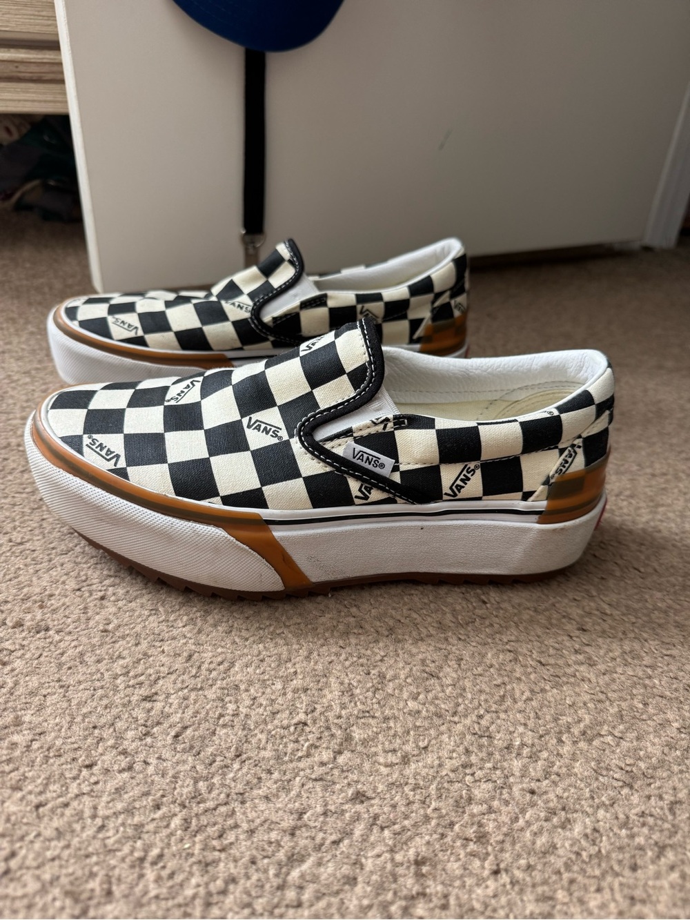 Vans Checkerboard Slip-On Sneakers in Black, White and Brown Trim